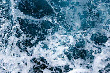 Aerial view to ocean waves.