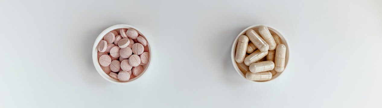 banner: close-up of vitamin B-12 (methylcobalamin+dibencozide) chewable tablets and vitamin B6 (pyridoxal-5-phosphate) capsules. dietary concept. dietary supplement topview photo