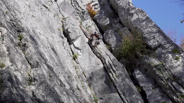 Man climbing rock close up