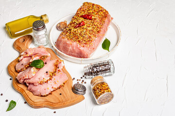Pork fillet for grilling, baking, or frying with flakes spices
