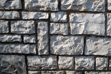 White stone wall, abstract background texture with old and vintage style pattern. garden wall design backdrop.