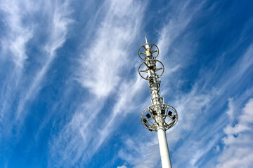 Wireless communication equipment on the shore under the background of blue sky and white clouds