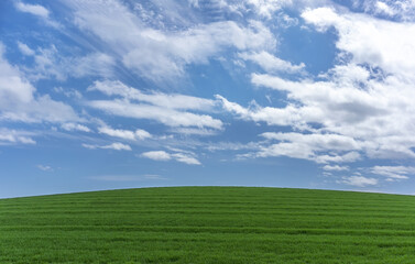 Beautiful green hill , blue sky and clouds in nature , Scotland