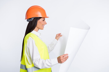 Profile photo of builder lady hold big paper roll toothy smile wear helmet shirt vest isolated white color background