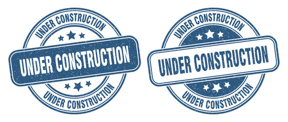 under construction stamp. under construction label. round grunge sign