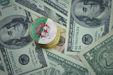 golden shining bitcoins with flag of algeria on a dollar money background.