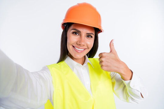 Photo Of Promoter Worker Lady Shoot Selfie Raise Thumb Up Wear Helmet Shirt Vest Isolated White Color Background