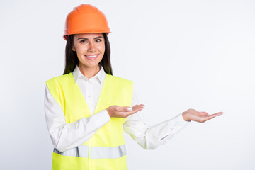 Photo of promoter lady hands hold empty space wear helmet shirt vest isolated white color background