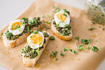 Egg and green pesto sandwiches.