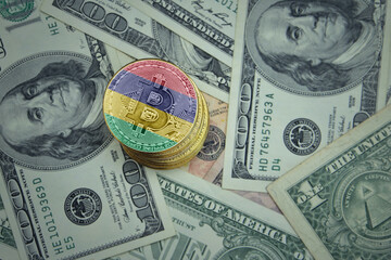 golden shining bitcoins with flag of mauritius on a dollar money background.