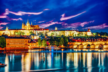 View of Prague Castle and Charles Bridge-famous historic bridge that crosses the Vltava river in Prague.