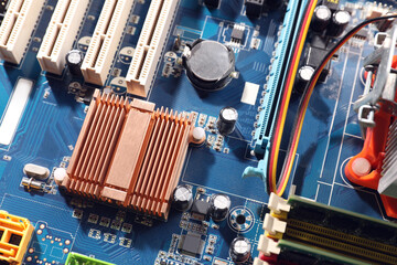 Computer motherboard as background, closeup. Electronic device