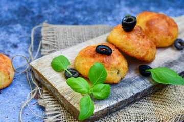 Home made gluten free muffins  with bio eggs ,parmesan cheese ,mushroom and  herbs on wooden background