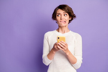 Photo portrait of stressed nervous female influencer put dislike looking at empty space isolated on...