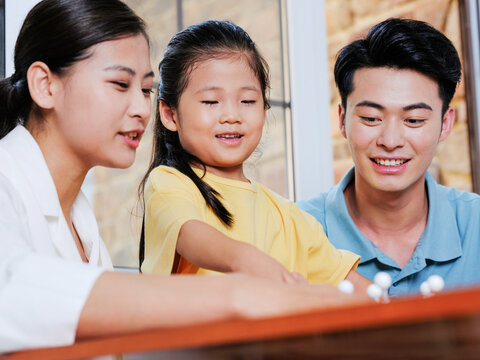 Happy Family Of Three Doing Molecular Structure Model Together