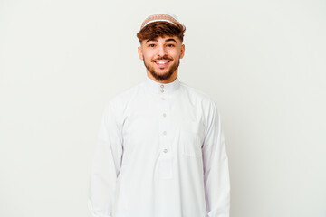 Young Arab man wearing the typical arabic costume isolated on white background happy, smiling and cheerful.