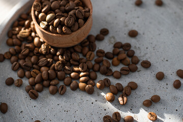 Coffee beans in a wooden cup