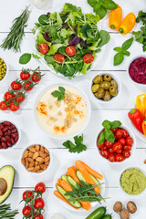 Obraz na płótnie Canvas Vegetables background healthy vegan clean eating organic food wooden board portrait format