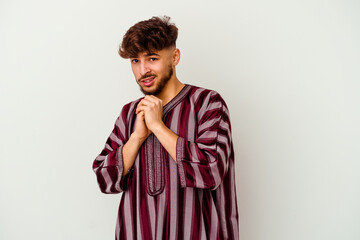 Young Moroccan man isolated on white background scared and afraid.