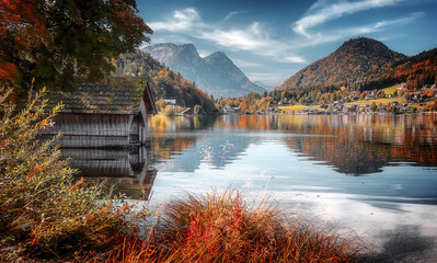 Scenic image of Ausrian nature in sunny day. Pleasure boat on a Grundlsee lake is one most popular place in world. best location for landscape photographers and bloggers. stunning natural background. © jenyateua