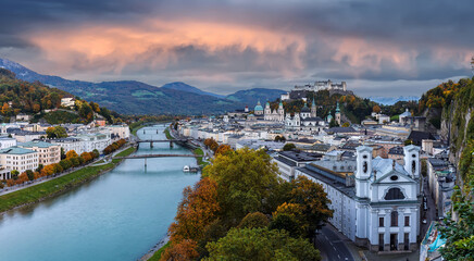 Aerial panoramic view of the famous historic city of Salzburg with Hohensalzburg Fortress and...