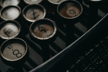 Detail retro typewriter machine on home