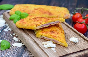 Home made Hot pockets with ham and cheese. Ketogenic  gluten free Turnover filled  with edam and prosciutto.