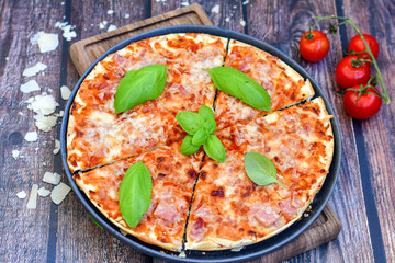  Home made italian pizza with mushrooms,ham and cheese. Italian food