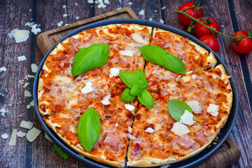  Home made italian pizza with mushrooms,ham and cheese. Italian food