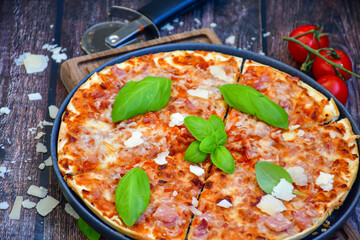  Home made italian pizza with mushrooms,ham and cheese. Italian food
