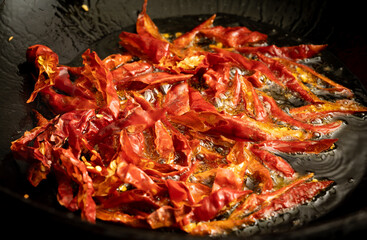 Dry-stir-fried chilli is a Chinese homely dish