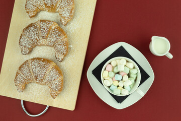 Croissants with coffee for breakfast and place for text