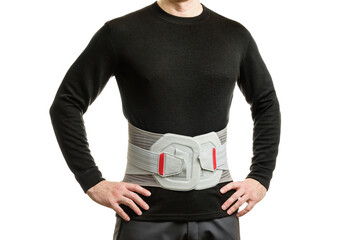 The torso of a man in an orthopedic corset on a white background.