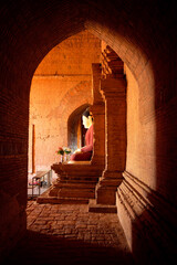 Buddha statue at the temple in Bagan, Myanmar.