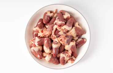 Fresh raw chicken heart on pure white background