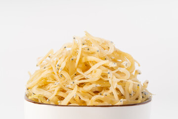 Dried spaghetti fish on pure white background