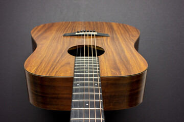 Naklejka premium acoustic guitar isolated on black