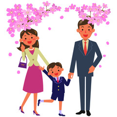 桜の下入学式に向かう男の子と父母