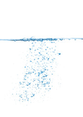 Water line with bubbles under surface against white background.