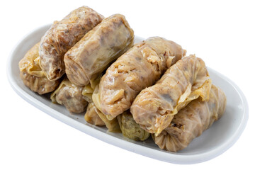 Cabbage wrap appetizer (mezze) isolated on white background. Healthy vegan food. Local name lahana sarması