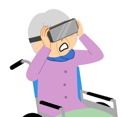 VRを楽しむ高齢女性