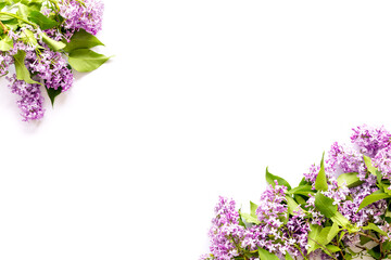 Flat lay of spring lilac flowers. Purple flowers with copy space, top view