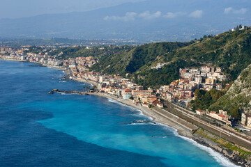 Fototapeta na wymiar the Taormina station built on the sea in a beautiful sunny early spring day