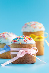 Sweet Easter cakes with colorful eggs. white Hyacinthus. holiday card