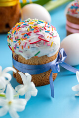 Sweet Easter cakes with colorful eggs. white Hyacinthus. holiday card