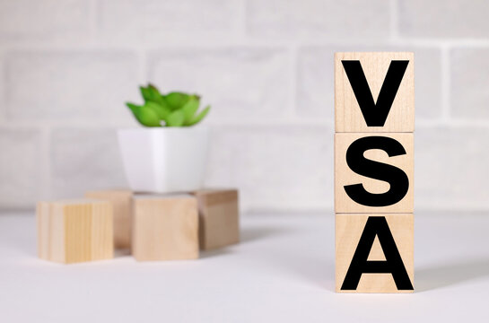 VSA . text on wood cubes. text in black letters on wood blocks
