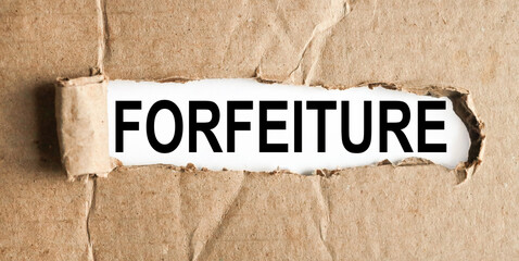 FORFEITURE .text on white paper over torn paper background.