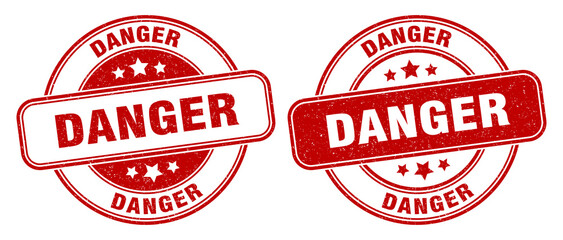 danger stamp. danger label. round grunge sign