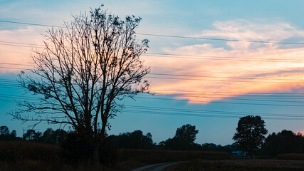 Beautiful sunset with a dramatic sky near Tabertshausen, Bavaria, Germany