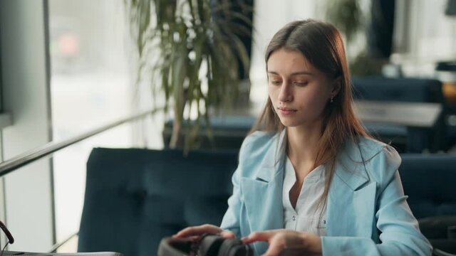 Portrait of a happy smiling girl listening to music on headphones